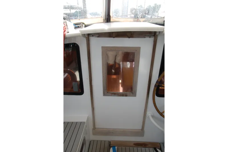 Slide: The Image of Interior view of 2000 Garcia 48 Raised Salon yacht with wooden accents. - 45