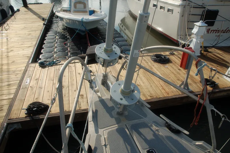 Slide: The Image of Sailboat docked at marina, Garcia 48 Raised Salon, 2000 model, with wooden pier. - 14
