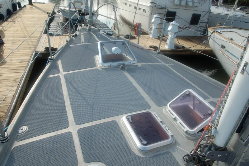 Slide: The Image of Deck view of 2000 Garcia 48 Raised Salon yacht docked at marina. - 13