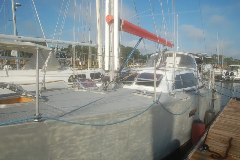Slide: The Image of Sailboat Garcia 48 Raised Salon 2000 docked at marina under clear sky. - 7