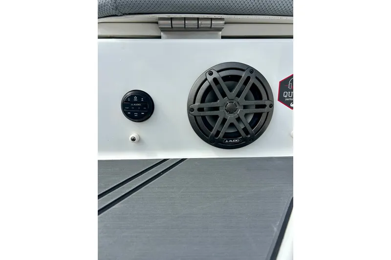 Slide: The Image of 2022 Scarab 215 ID boat audio system featuring JL Audio speaker and control panel. - 15