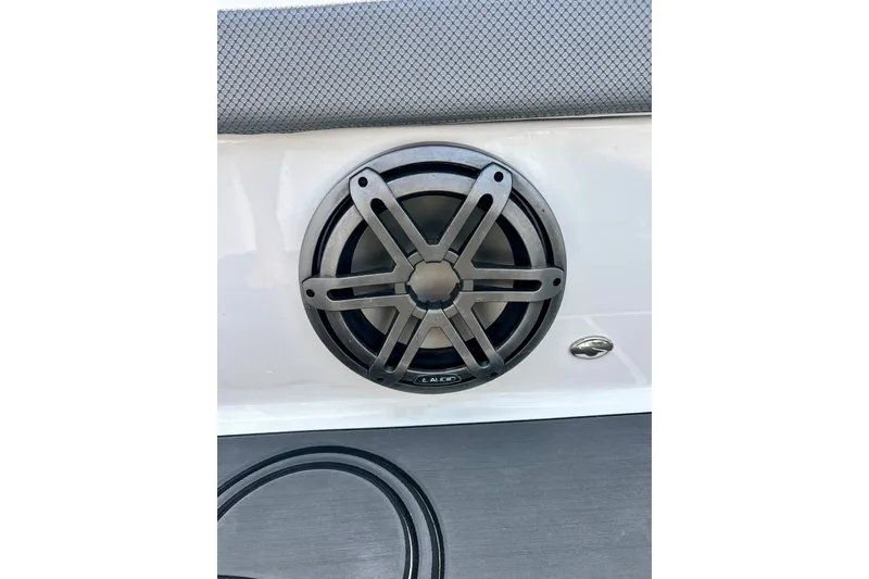 Slide: The Image of Speaker on 2022 Scarab 215 ID boat interior, featuring sleek design and modern audio system. - 48