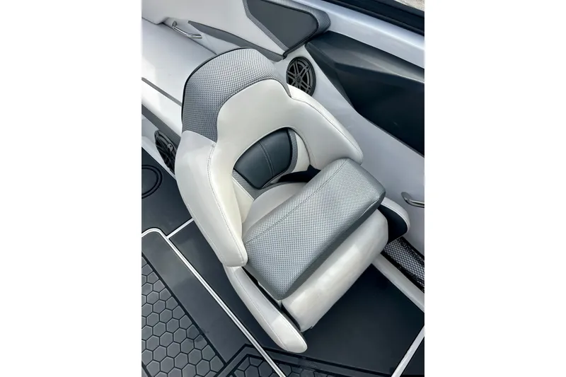 Slide: The Image of Luxury seating in 2022 Scarab 215 ID boat, featuring sleek design and premium materials. - 33