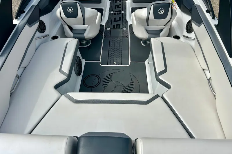Slide: The Image of Interior of 2022 Scarab 215 ID boat with stylish seating and modern design. - 20
