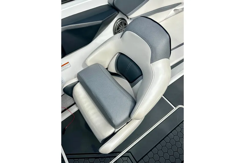 Slide: The Image of 2022 Scarab 215 ID boat seat with gray and white upholstery, featuring a modern design. - 31