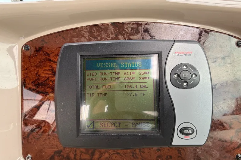 Slide: The Image of Mercury SmartCraft display on 2006 Sea Ray Sundancer 320 showing vessel status and fuel levels. - 21