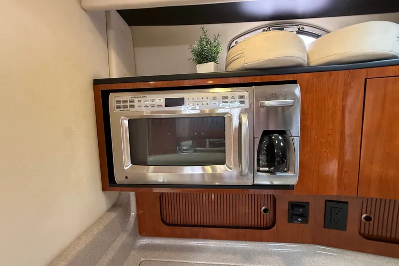 Slide: The Image of Microwave and coffee maker in 2006 Sea Ray Sundancer 320 yacht kitchen. - 32