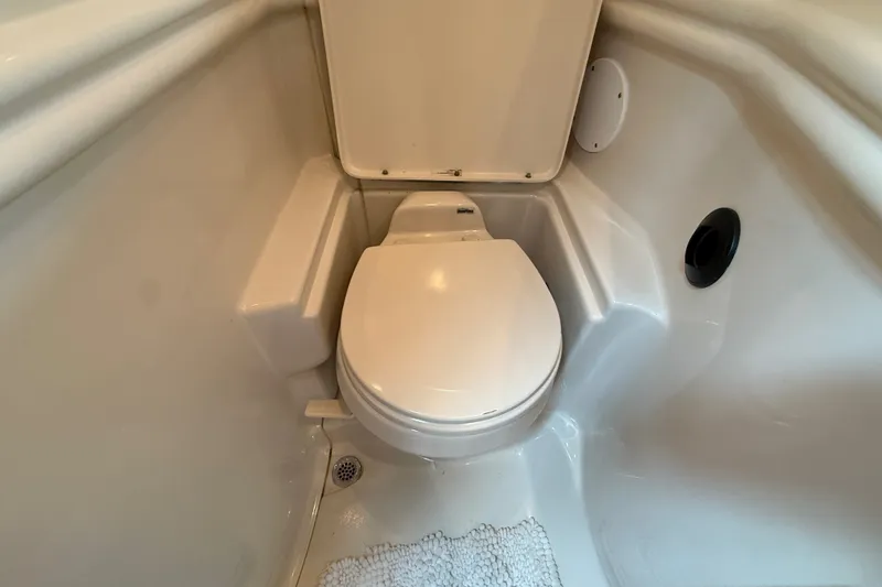 Slide: The Image of Compact marine toilet in 2006 Sea Ray Sundancer 320 boat bathroom. - 48