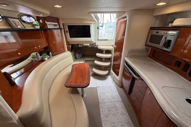 Slide: The Image of Luxurious interior of a 2006 Sea Ray Sundancer 320 yacht with modern amenities. - 40