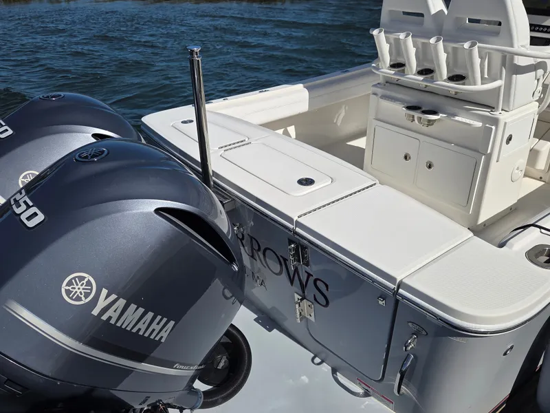 Slide: The Image of The image shows the stern of a 2020 Regulator 25 boat with twin Yamaha engines. - 3