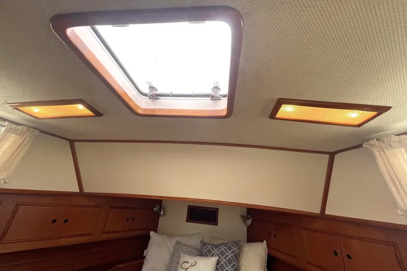 Slide: The Image of OVERHEAD HATCH IN MASTER STATEROOM WITH HEADLINERS IN GREAT SHAPE!! - 34