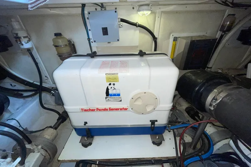Slide: The Image of Engine room of 1998 Grand Banks 43 Eastbay FB with Fischer Panda generator. - 59