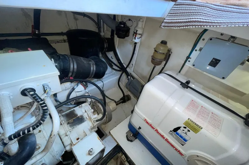 Slide: The Image of Engine room of 1998 Grand Banks 43 Eastbay FB with Fischer Panda generator. - 57