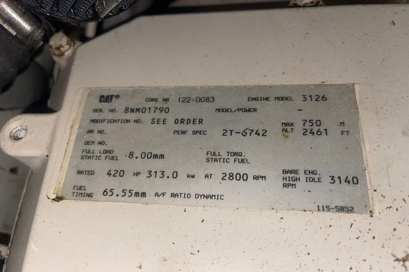 Slide: The Image of Engine specification plate for 1998 Grand Banks 43 Eastbay FB, CAT model 3126, 420 HP. - 58