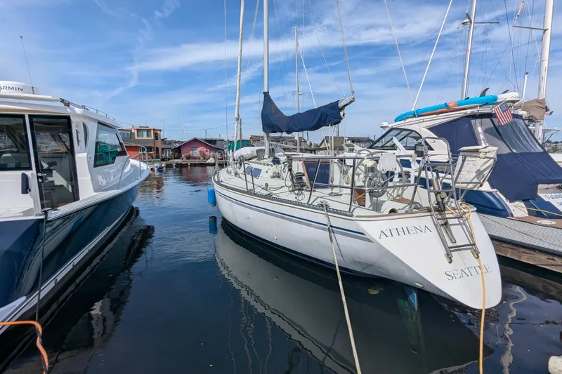Slide: The Image of Sceptre 36 sailboat docked in marina, clear sky, 1980 model. - 14