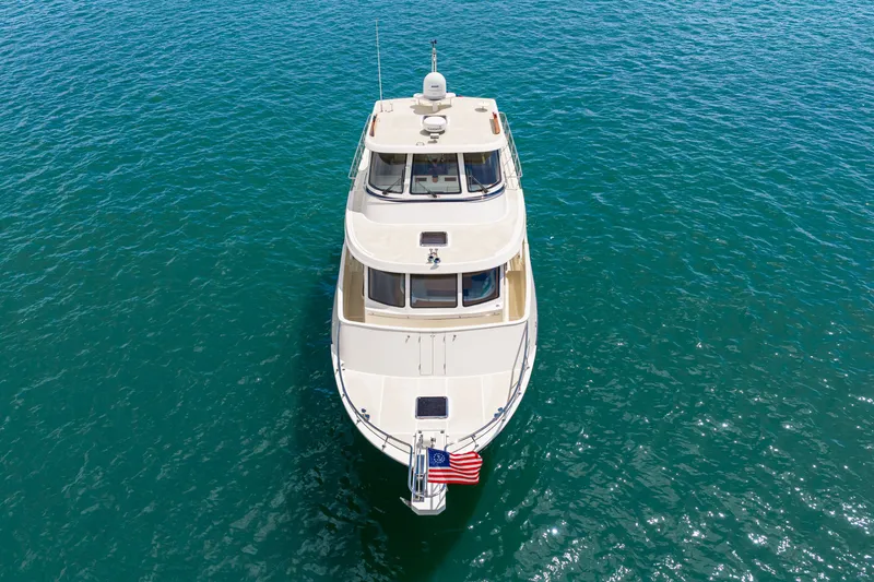 Slide: The Image of 2017 Marlow Explorer 49E yacht on clear blue water, aerial view. - 28