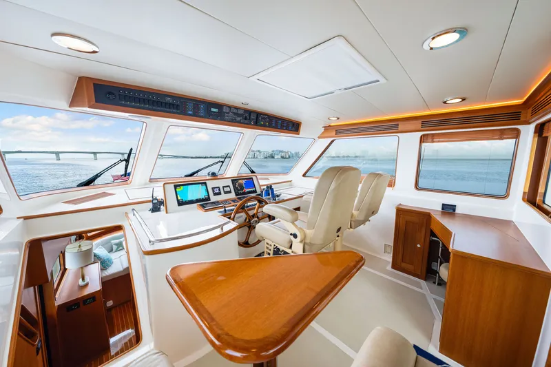 Slide: The Image of Luxurious 2017 Marlow Explorer 49E yacht interior with panoramic windows and modern navigation equipment. - 31