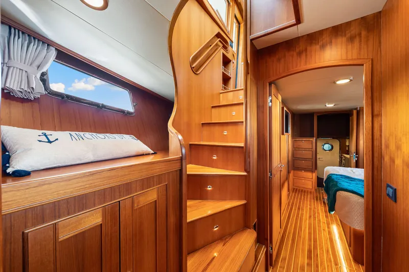 Slide: The Image of Luxurious interior of 2017 Marlow Explorer 49E yacht with wooden finishes and cozy cabin. - 42