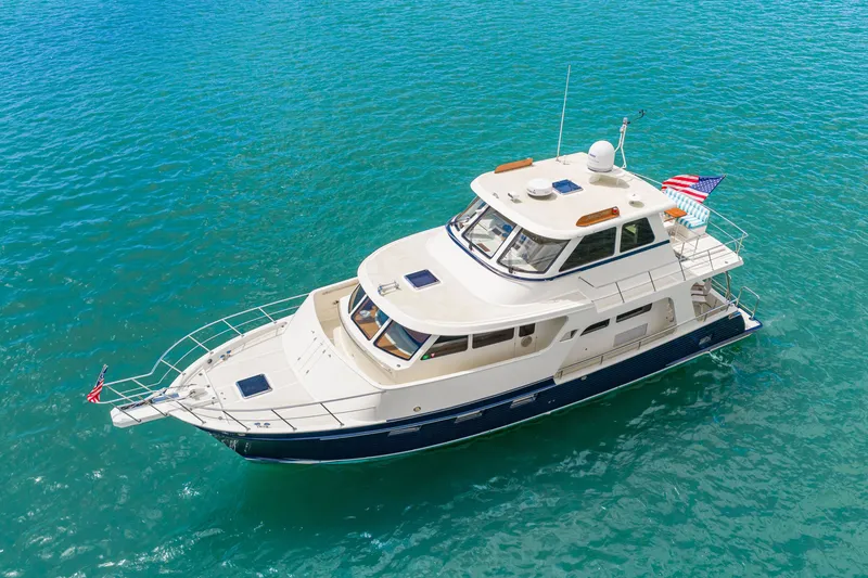 Slide: The Image of 2017 Marlow Explorer 49E yacht on clear blue water, aerial view. - 7