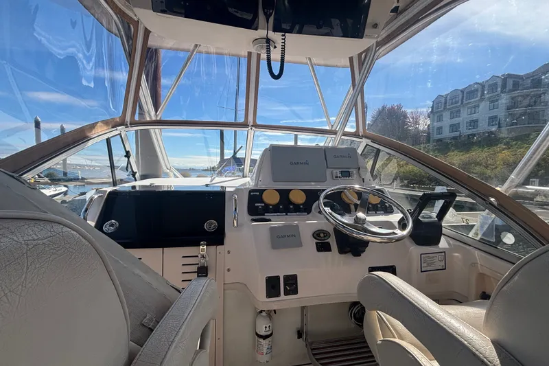 Slide: The Image of Interior view of 2005 Grady White 282 Sailfish boat cockpit with steering wheel and controls. - 37