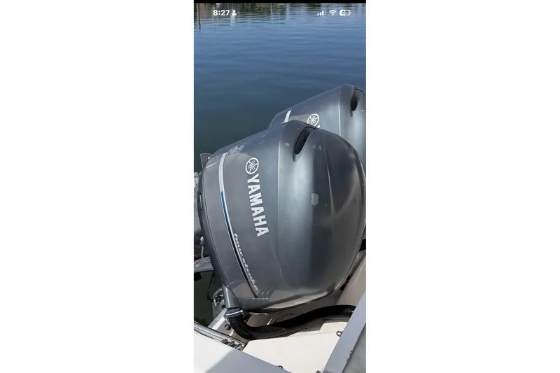 Slide: The Image of Twin Yamaha outboard motors on a 2005 Grady White 282 Sailfish boat. - 20