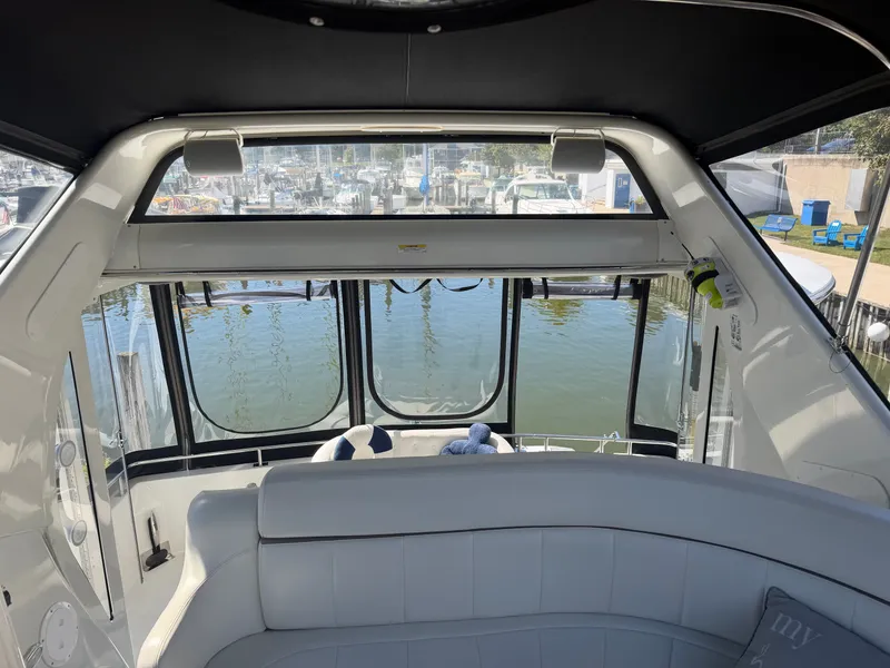 Slide: The Image of Interior view of a 2000 Carver 396 Motor Yacht overlooking the marina. - 22