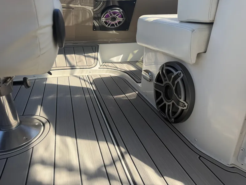 Slide: The Image of The interior of a 2000 Carver 396 Motor Yacht features sleek seating and speakers. - 29