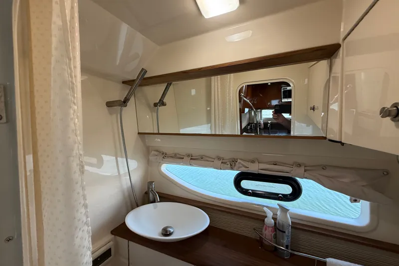 Slide: The Image of Bathroom interior of 2013 Sea Ray Sundancer 350 yacht with sink and mirror. - 45