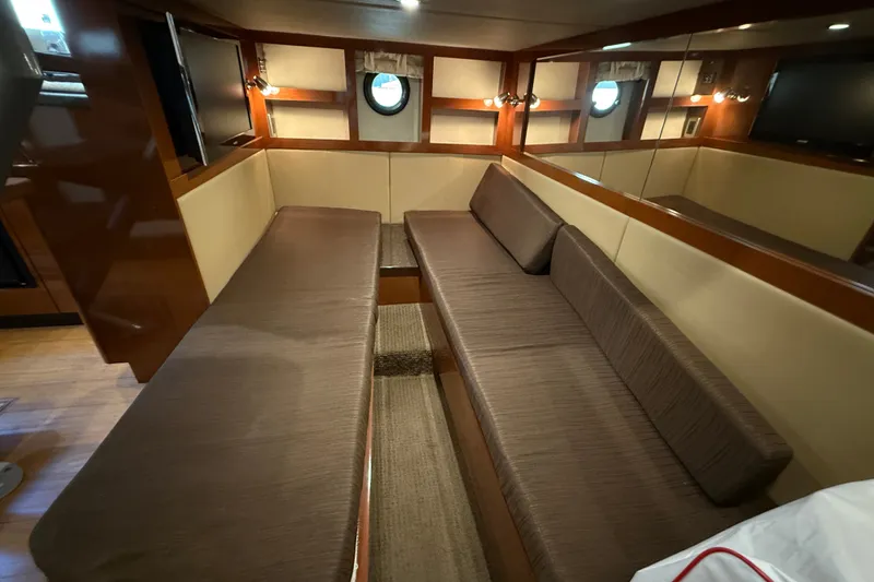 Slide: The Image of Interior of 2013 Sea Ray Sundancer 350 yacht with cozy seating and elegant wood finishes. - 43