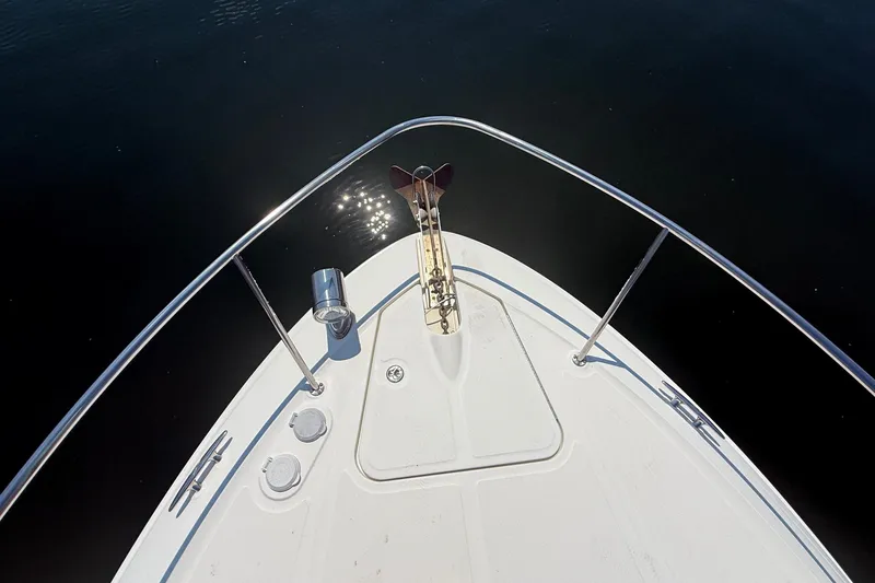 Slide: The Image of Bow view of 2013 Sea Ray Sundancer 350 yacht with anchor and railings. - 19