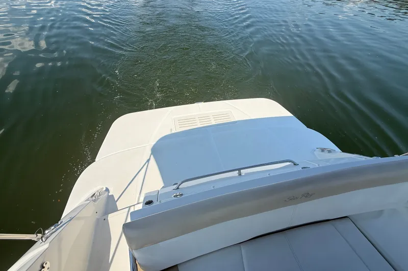 Slide: The Image of 2013 Sea Ray Sundancer 350 boat stern view on calm water. - 24