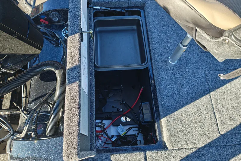 Slide: The Image of Interior view of a 2027 Nitro Z21 XL Pro boat showing storage and wiring compartments. - 42