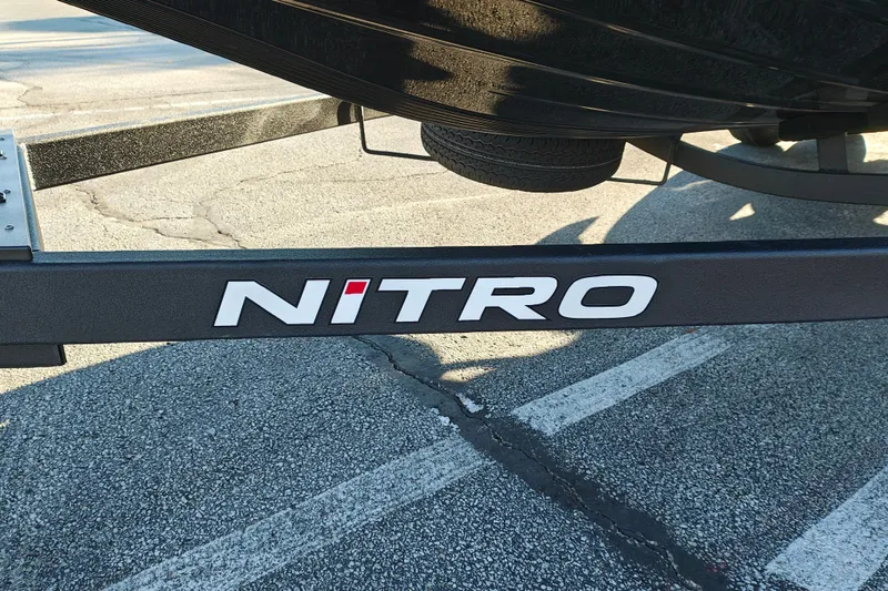 Slide: The Image of Trailer of 2027 Nitro Z21 XL Pro boat in parking lot. - 4