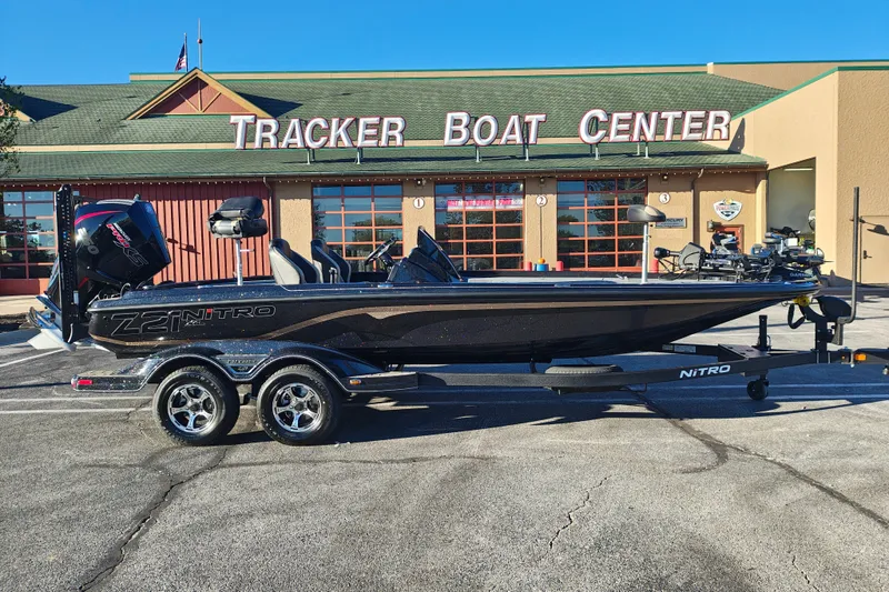 The Image of 2027 Nitro Z21 XL Pro boat at Tracker Boat Center, parked on a trailer. - 0