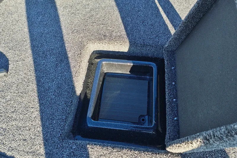 Slide: The Image of Open storage compartment on 2027 Nitro Z21 XL Pro boat deck. - 35