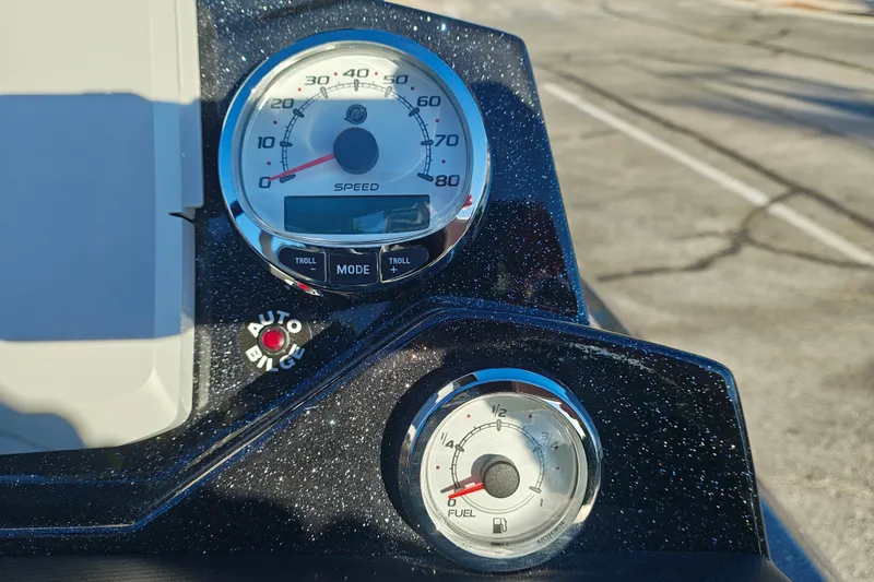 Slide: The Image of Dashboard of a 2027 Nitro Z21 XL Pro boat with speedometer and fuel gauge. - 14
