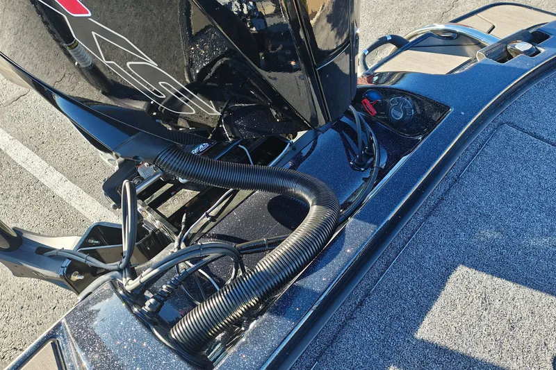 Slide: The Image of 2027 Nitro Z21 XL Pro boat engine detail with cables and controls on deck. - 43