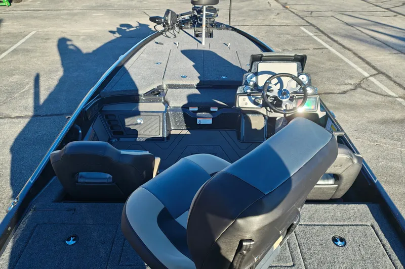 Slide: The Image of 2027 Nitro Z21 XL Pro boat interior with steering wheel and seating. - 11