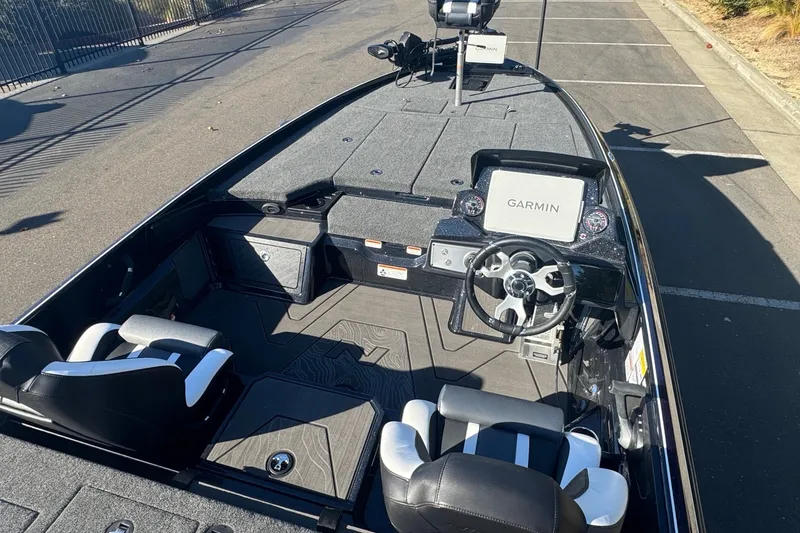 Slide: The Image of 2027 Nitro Z21 XL Pro boat interior with Garmin navigation system and dual seating. - 12