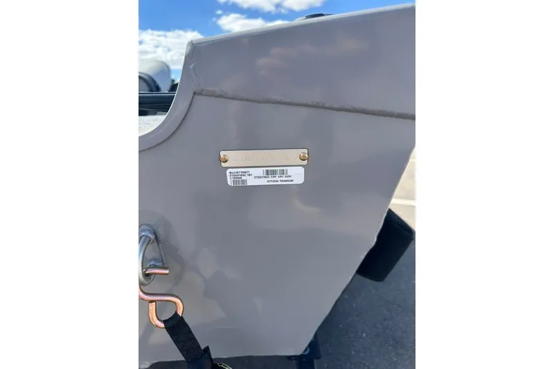 Slide: The Image of 2027 Tracker Super Guide V-16 SC boat with identification plate and hook. - 38