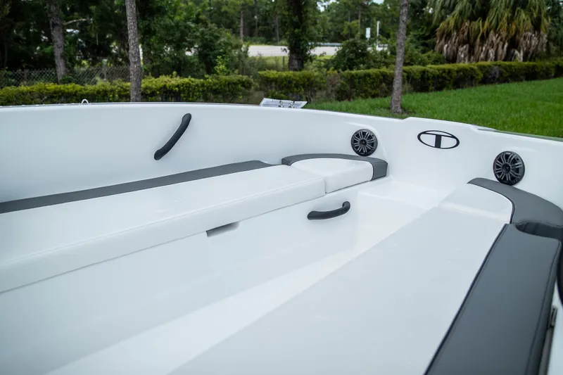 Slide: The Image of Interior view of 2027 Tahoe T18 boat with seating and speakers. - 12