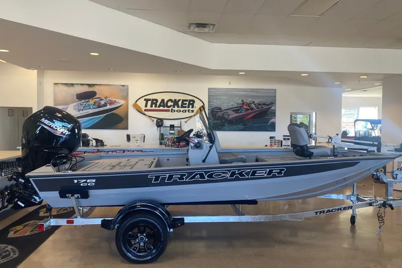 The Image of 2027 Tracker Bass Tracker 175 CC boat displayed in showroom with Mercury engine. - 0