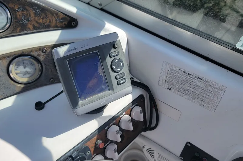 Slide: The Image of Control panel of a 2001 Hurricane SunDeck 217 OB boat with Garmin Fishfinder. - 19