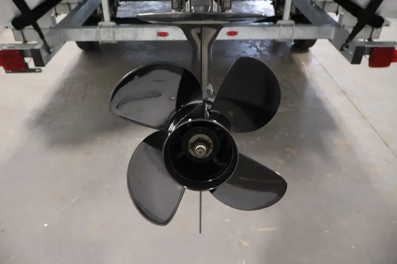 Slide: The Image of Close-up of a 2021 Sweetwater 2086C boat propeller on a trailer. - 34