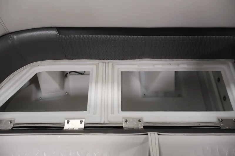 Slide: The Image of Interior storage compartments of a 2021 Sweetwater 2086C boat. - 9