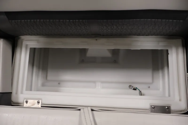 Slide: The Image of Interior storage compartment of a 2021 Sweetwater 2086C boat. - 23