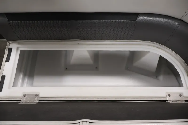 Slide: The Image of Open storage compartment in 2021 Sweetwater 2086C boat, featuring sleek interior design. - 8