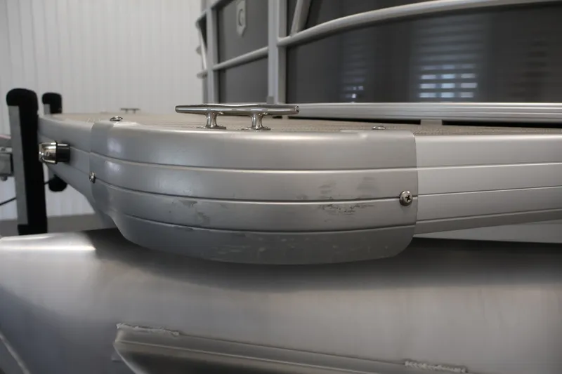 Slide: The Image of Close-up of a 2021 Sweetwater 2086C pontoon boat's metallic bow detail. - 41