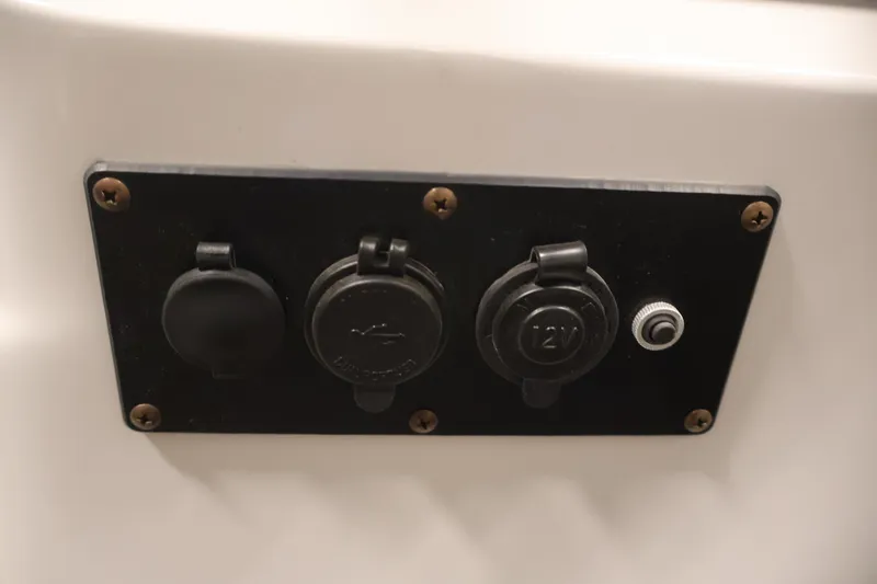 Slide: The Image of Control panel with 12V socket on 2021 Sweetwater 2086C boat. - 30