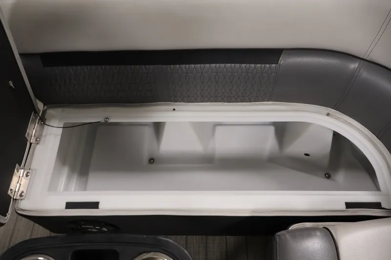 Slide: The Image of Interior storage compartment of a 2021 Sweetwater 2086C boat, featuring sleek design. - 24